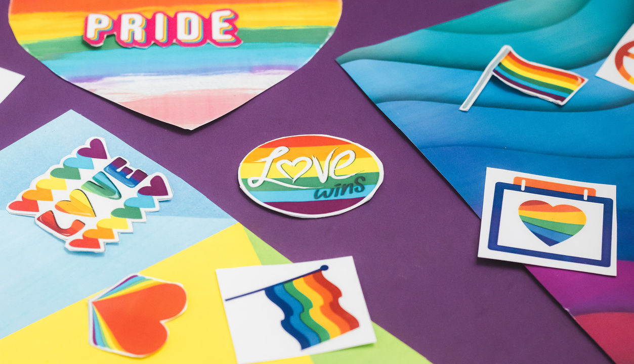 Pride Stickers on Purple Background