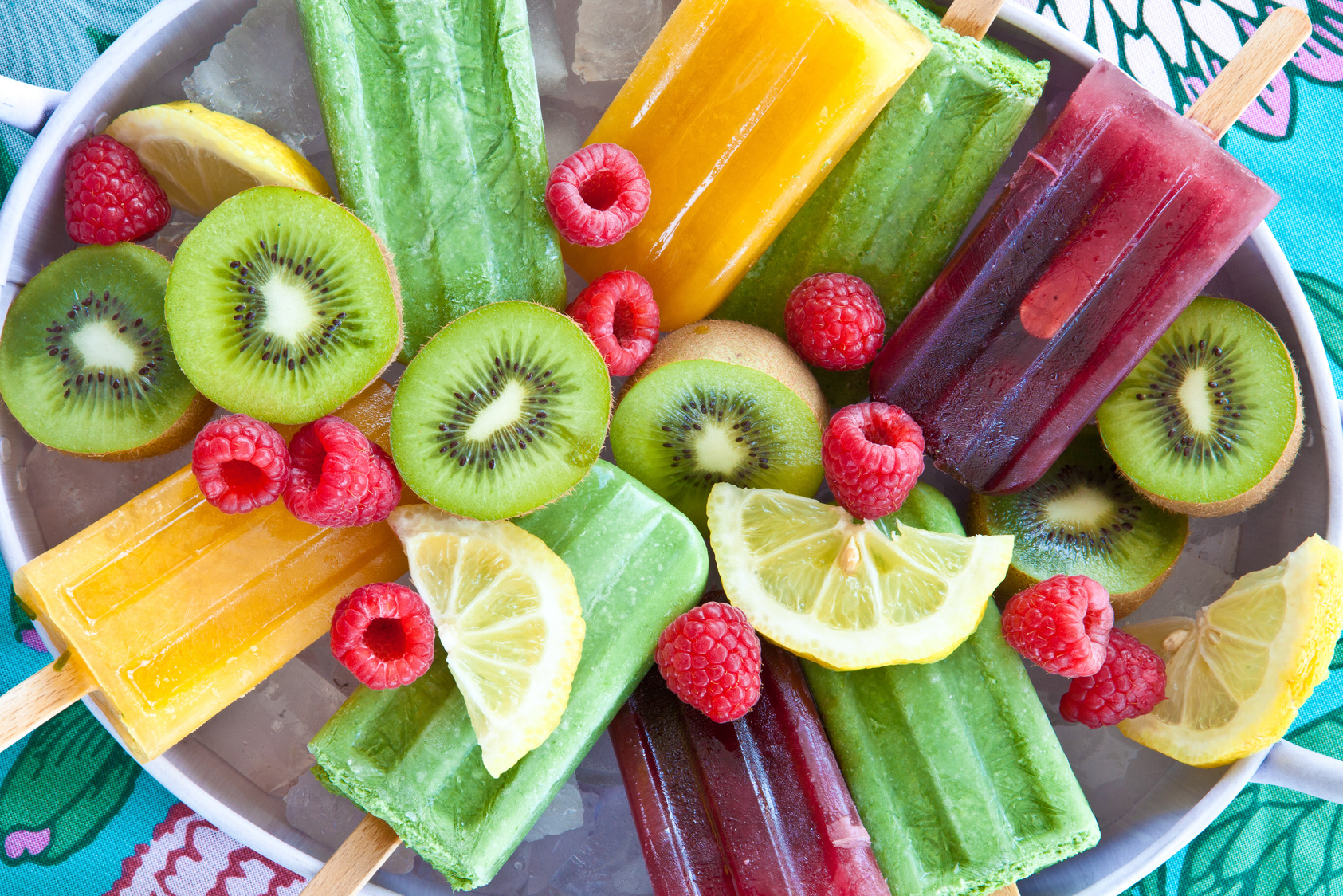 Colorful popsicles with fresh fruits