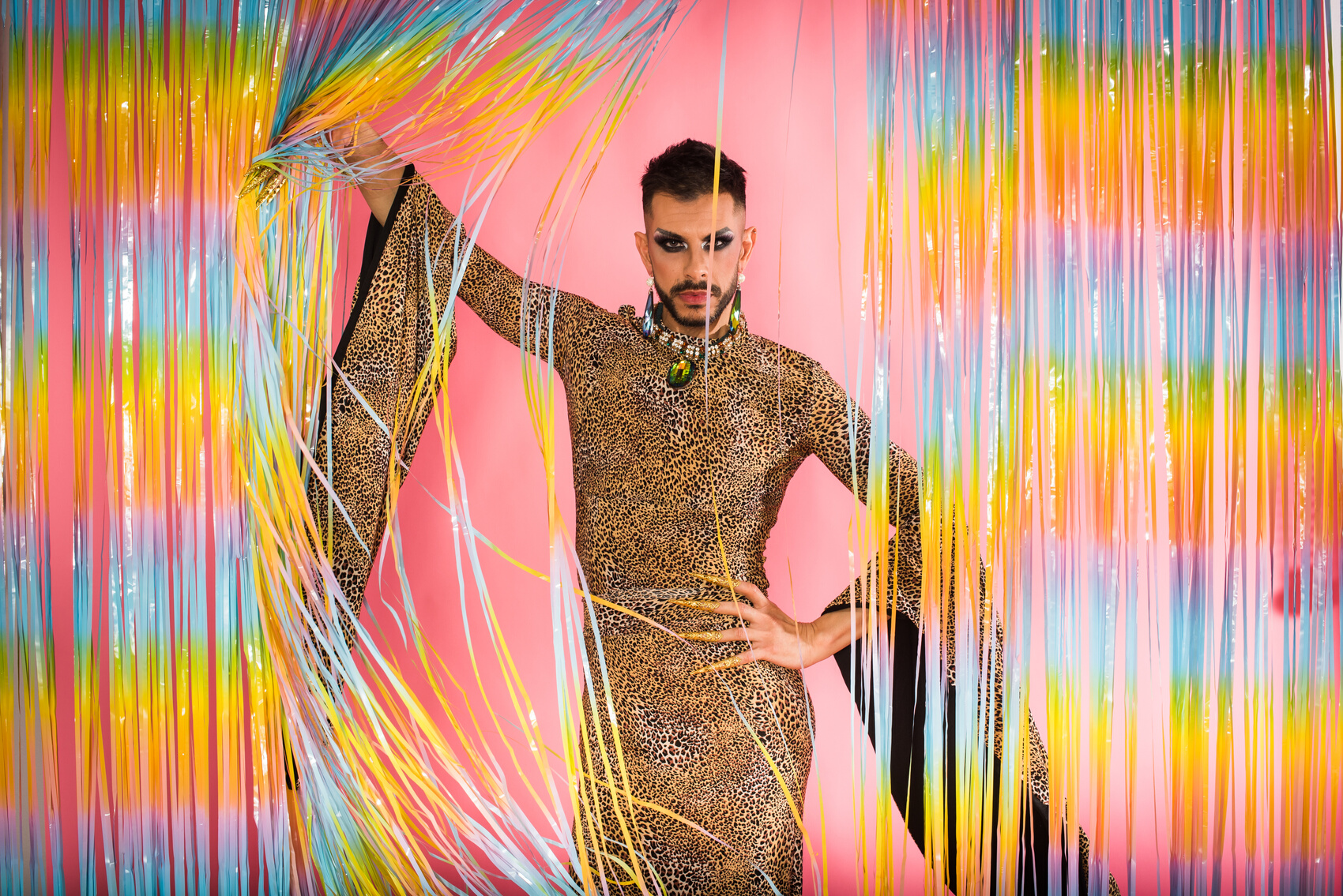Drag Queen on Metallic Tinsel Background