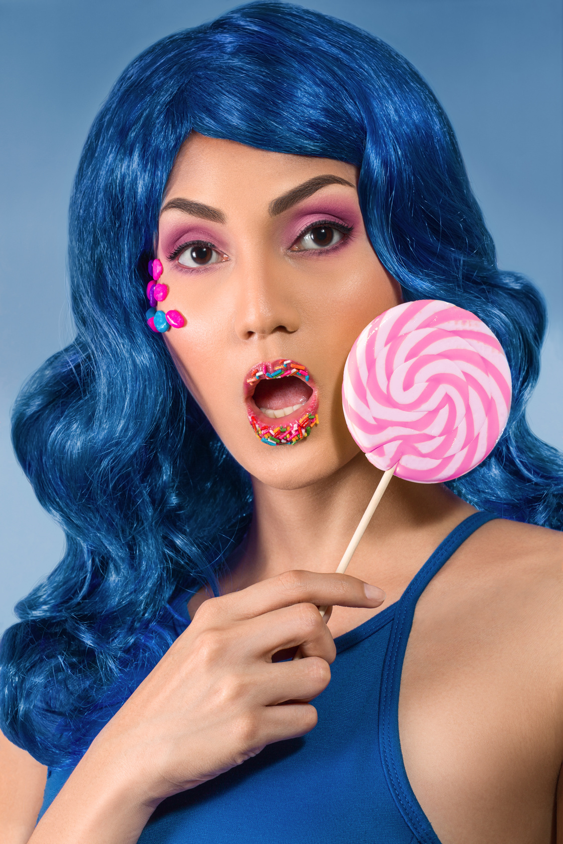 Young woman with lolipop