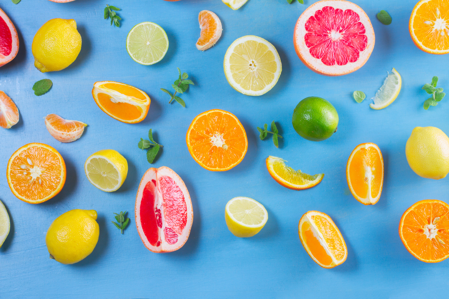 Citrus Fruits on Blue Background